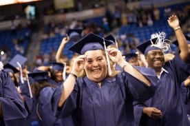 graduates at commencement ceremony