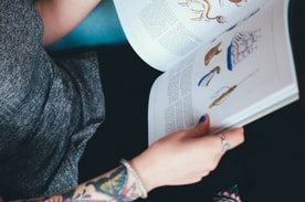 Woman reading a book.