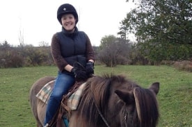 Woman Horseback Riding