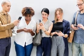 people on their phones