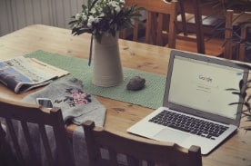 Laptop on wooden table