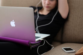Woman studying with Macbook and Iphone