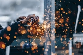 Person using a welding torch