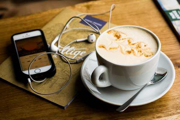 Iphone Headphones playing music & coffee