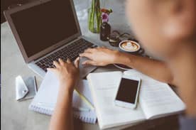 Person studying at a computer.