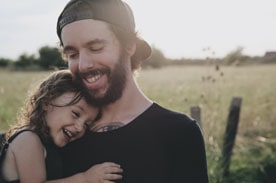 Father and Daughter Smiling