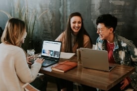 people with laptops working