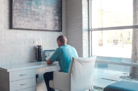 man studying at home