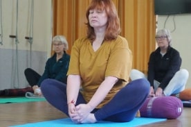 women doing yoga.