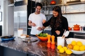 chefs in kitchen.