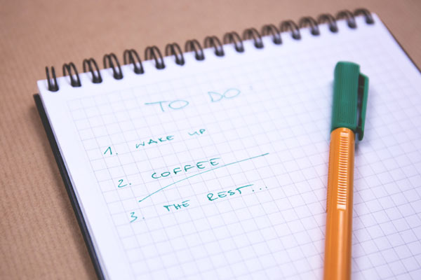To-Do notebook with pen.