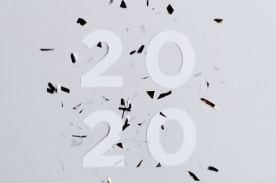 2020 text with confetti background.