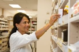 pharmacist organizing prescriptions.