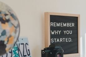 sign with text 'remember why you started.'
