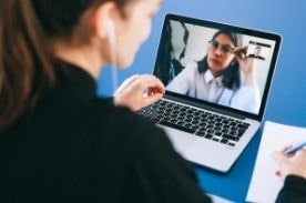 Women in a video meeting.