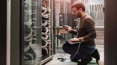 man working on a computer.