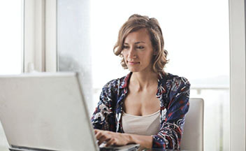 woman working at laptop.