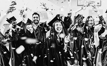 graduates celebrating.