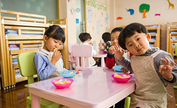 preschool children at table.