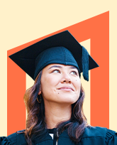 smiling woman wearing a cap and gown.