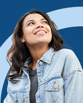 Young woman gazing upward with an optimistic look on her face.