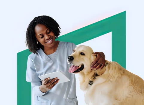 Woman in light blue scrubs with dog.