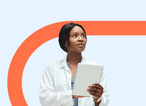 healthcare worker holding a tablet.