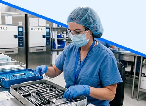 Sterile processing technician in PPE organizing surgical tools.