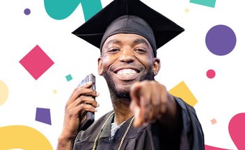 Penn Foster Graduate pointing at the camera and smiling during Graduation 2024.