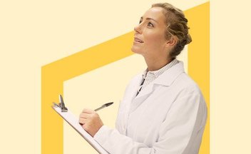 woman holding a clipboard looking up.