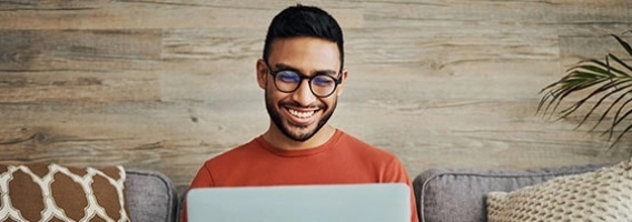 man on laptop.