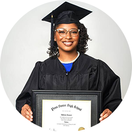Latiaa S., 2025 Penn Foster High School grad wearing black cap and gown, holding diploma.