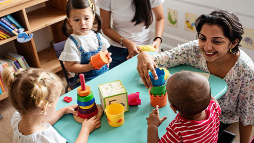 child care professional teaching with students