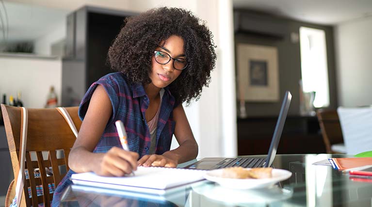 student at computer studying.
