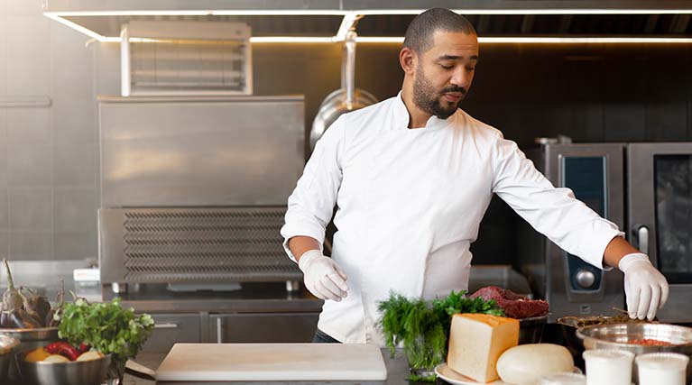 gourmet chef cooking in kitchen.