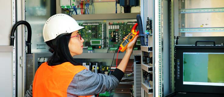 industrial electrician troubleshooting electrical system.
