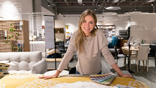 interior decorator working in office.