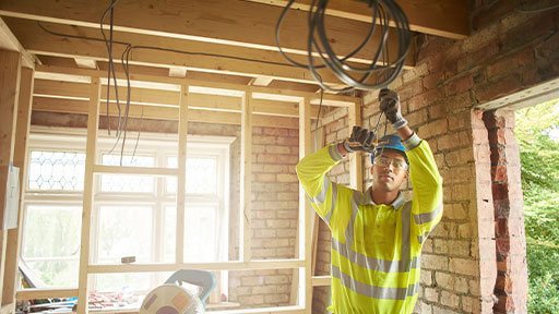 electrician working in a home.