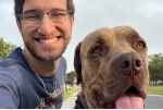 Penn Foster Vet Tech student taking selfie with his dog.